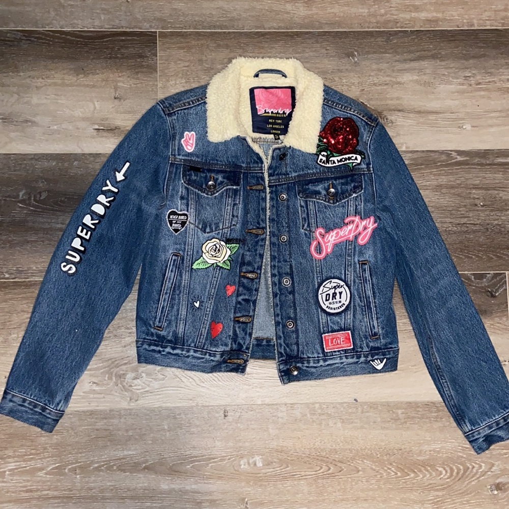 Women’s Super Dry blue denim jean jacket w/ patches size small